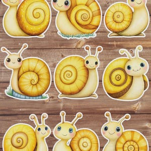 May include: Nine cartoon snail stickers with yellow shells and smiling faces are arranged on a wooden background. The snails have a variety of shell patterns and expressions, with some featuring blue eyes.