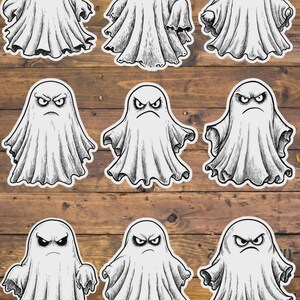May include: A collection of nine individual ghost stickers arranged in a grid. Each ghost is illustrated in a white and black sketch style with a distinctively grumpy facial expression, featuring furrowed brows and a downturned mouth.