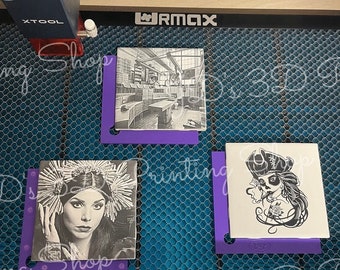 May include: Three ceramic tiles with different designs. The first tile has a black and white photograph of a building interior. The second tile has a black and white photograph of a woman wearing a crown of feathers. The third tile has a black and white illustration of a pirate with a skull and crossbones.