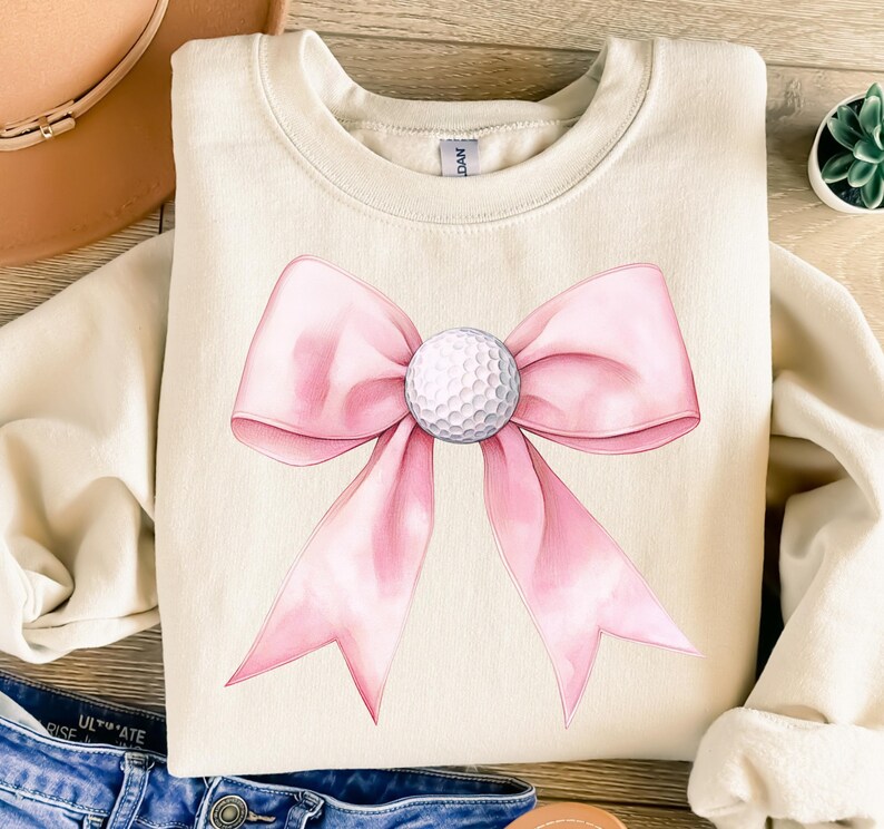 Golf girl png, Coquette golf, Golf ball png, Golf girly, Pink golf png, Golf lover png Golf mama png, Golf mom png, Golf png, Preppy png, Sports png, golf ball bow, golf shirt png
Coquette golf girl PNG with pink golf, preppy sports style, golf ball bow, and golf mom designs, perfect for golf lovers and shirts!