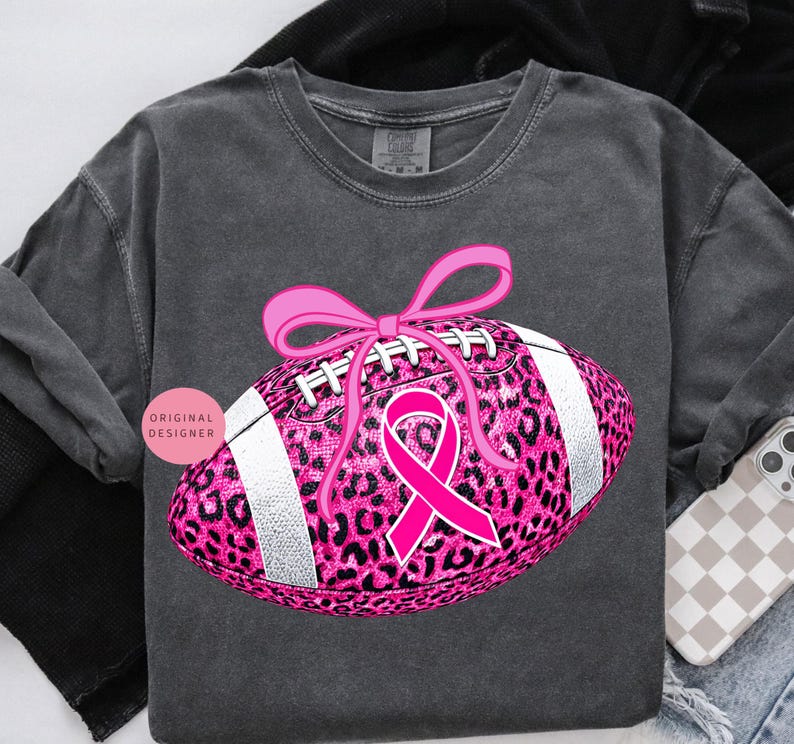 Breast cancer football png, Pink ribbon png, Leopard football png, Pink out sublimation design, October awareness png, Coquette fall png
Pink glitter football with leopard print, pink ribbon & coquette bow October breast cancer awareness shirts and sublimation.
breast cancer png, pink ribbon png, pink out png, tackle cancer png, leopard football png, football png, pink football png, cancer awareness png, pink October png, football mom png, preppy breast cancer, game day png, pink out football