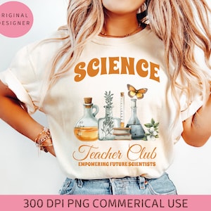 May include: A white t-shirt with the text "Science Teacher Club Empowering Future Scientists" in orange lettering. The design features a butterfly, beakers, and plants in watercolor style.