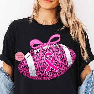 Breast cancer football png, Pink ribbon png, Leopard football png, Pink out sublimation design, October awareness png, Coquette fall png
Pink glitter football with leopard print, pink ribbon & coquette bow October breast cancer awareness shirts and sublimation.
breast cancer png, pink ribbon png, pink out png, tackle cancer png, leopard football png, football png, pink football png, cancer awareness png, pink October png, football mom png, preppy breast cancer, game day png, pink out football