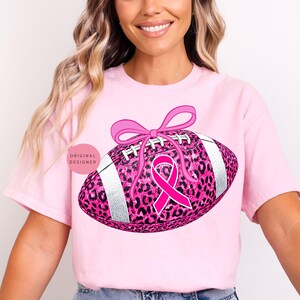 Breast cancer football png, Pink ribbon png, Leopard football png, Pink out sublimation design, October awareness png, Coquette fall png
Pink glitter football with leopard print, pink ribbon & coquette bow October breast cancer awareness shirts and sublimation.
breast cancer png, pink ribbon png, pink out png, tackle cancer png, leopard football png, football png, pink football png, cancer awareness png, pink October png, football mom png, preppy breast cancer, game day png, pink out football