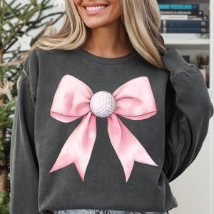 Golf girl png, Coquette golf, Golf ball png, Golf girly, Pink golf png, Golf lover png Golf mama png, Golf mom png, Golf png, Preppy png, Sports png, golf ball bow, golf shirt png
Coquette golf girl PNG with pink golf, preppy sports style, golf ball bow, and golf mom designs, perfect for golf lovers and shirts!