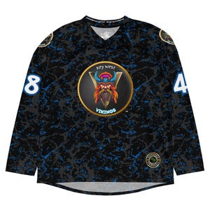 May include: A long-sleeve hockey jersey with a black and blue marbled pattern. The front features a circular logo with a Viking illustration and the text Key West VIKINGS. The sleeves display the numbers 8 and 4 in white with blue outlines.