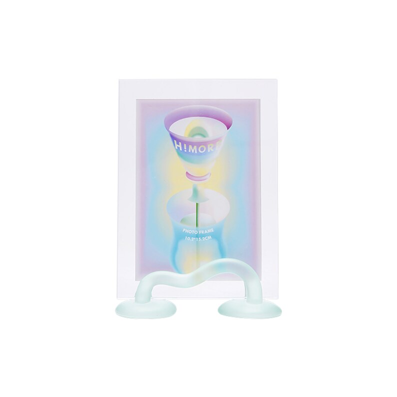 May include: A white photo frame with a colorful abstract design inside. The frame is held up by a clear, wavy stand with two round bases.