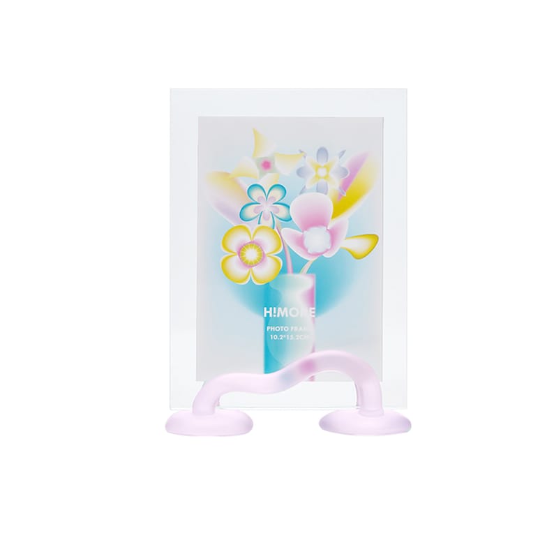 May include: A pink glass photo frame with a clear glass front and a wavy stand. The frame has a colorful floral design inside and the text "HI!MOLE PHOTO FRAME 10.2"*12.7"*2.5CM" printed on the bottom.