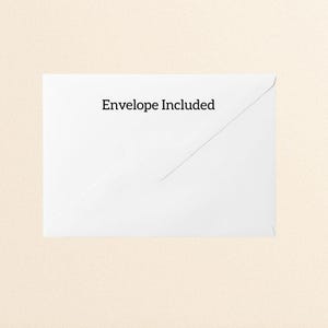May include: A white envelope with the text "Envelope Included" printed in black. The envelope is on a light beige background.
