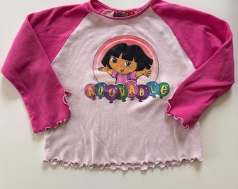Vintage 2000er Jahre Dora the Entdecker Langarm-Shirt - Größe 6 - Pinkes Raglan-T-Shirt - Kidcore Y2K Ästhetik