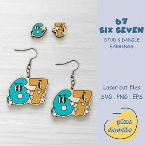 May include: Earrings featuring the numbers 6 and 7 in a cartoon style. The earrings are in blue and tan with black outlines and white accents. The text "SIX SEVEN" and "STUD & DANGLE EARRINGS" is also visible.