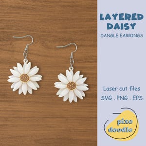 May include: White layered daisy dangle earrings with gold centres. Laser cut files: SVG, PNG, EPS. Pixo Doodle.