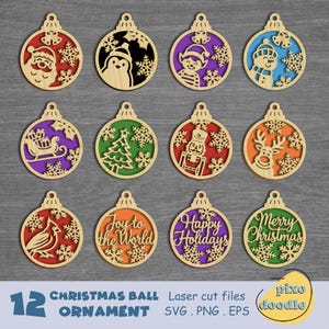 May include: A set of twelve laser-cut wooden Christmas ornaments. Each ornament features a unique design, including Santa Claus, a penguin, an elf, a snowman, a sleigh, a Christmas tree, a nutcracker, a reindeer, a cardinal, and holiday phrases. The ornaments are in various colors.