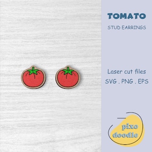 May include: A pair of red tomato stud earrings. The earrings are made of wood and have a laser-cut design. The text "TOMATO STUD EARRINGS" is visible in the image. The text "Laser cut files SVG. PNG. EPS" is also visible in the image.