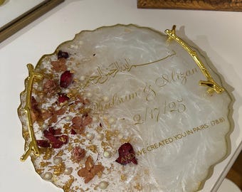May include: White resin tray with gold leaf and dried flowers. The tray has a gold rim and two gold branches with a gold inscription that reads "Allah SWT" and "Khulsum & Mlizan 9/17/25 AND WE CREATED YOU IN PAIRS (78:8)"