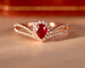 Peer Moissaniet Halo-verlovingsring: rood robijnaccent, roségoud