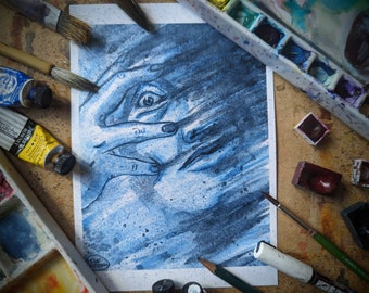 May include: A blue and black watercolour painting of a person's face with their hand covering their eye. The painting is on a white sheet of paper and surrounded by art supplies, including paint tubes, brushes, and a pencil.