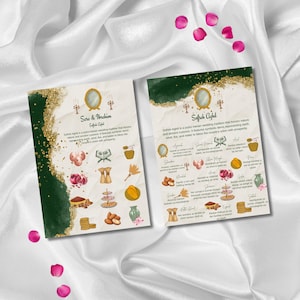 May include: Two wedding invitation cards with gold accents and illustrations. The cards feature text and images related to a wedding ceremony. The background is white silk with scattered pink flower petals.