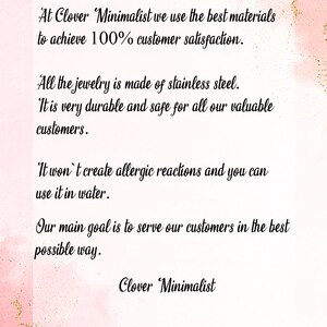 May include: Text on a pink background with gold glitter. The text reads: "At Clover Minimalist we use the best materials to achieve 100% customer satisfaction. All the jewelry is made of stainless steel. It is very durable and safe for all our valuable customers. It won't create allergic reactions and you can use it in water. Our main goal is to serve our customers in the best possible way. Clover Minimalist"