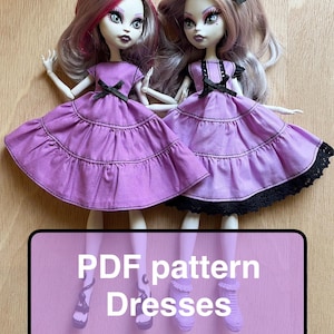 May include: Two dolls in tiered lavender dresses with black bows. The dolls have pink and grey hair and are posed together. The image includes the text "PDF pattern Dresses" in a purple rectangle.