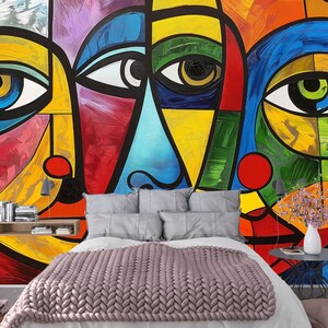 Picasso-inspired abstract faces on peel and stick wallpaper, offering a colorful and artistic update to your home decor.