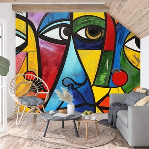 Picasso-inspired abstract faces on peel and stick wallpaper, offering a colorful and artistic update to your home decor.