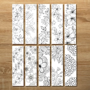 May include: Set of eight black and white printable bookmark designs featuring floral patterns. The bookmarks are perfect for coloring and adding a personal touch to your reading experience.
