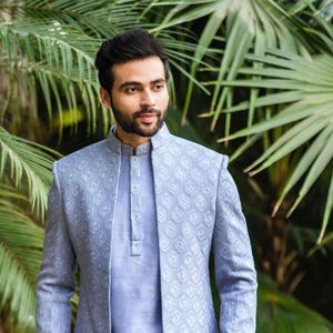 PURVAZ  Elegant Sky Blue Indo-Western Sherwani for Men – Light Jacquard Embroidered Wedding & Festive Wear