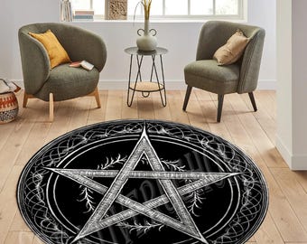 May include: A black and white round rug with a pentagram design. The pentagram is surrounded by a circular pattern of intricate lines. The rug is on a wooden floor.