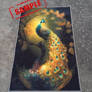 May include: Rectangular rug featuring a vibrant peacock perched on a tree branch. The peacock has blue and gold plumage, set against a dark background with a warm, golden glow. The word "SAMPLE" is stamped in red.