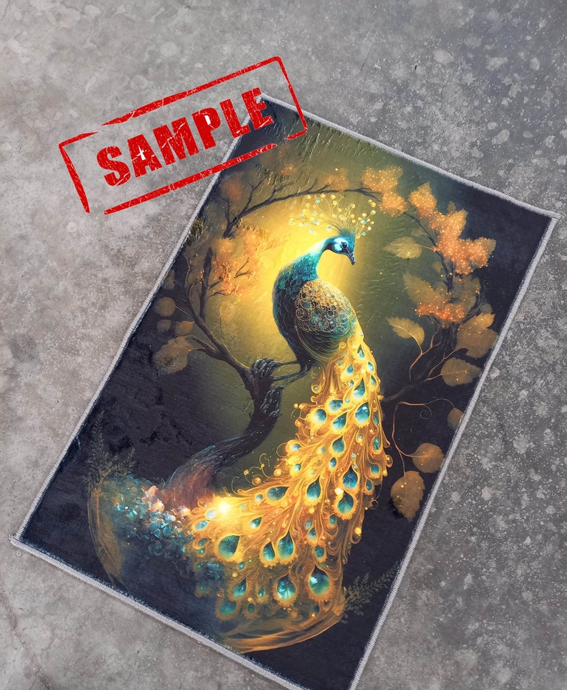 May include: Rectangular rug featuring a vibrant peacock illustration. The peacock has a blue head and body with a long, flowing tail in shades of gold and teal. The background is a mix of dark green and gold, with tree branches and leaves. The word "SAMPLE" is stamped on the rug.