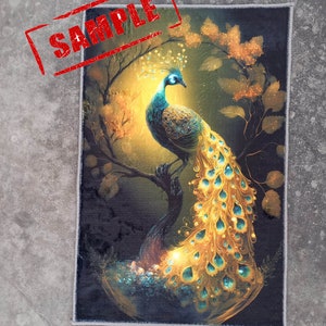 May include: A rectangular rug featuring a vibrant peacock illustration. The peacock, with its blue and gold plumage, is perched on a tree branch against a backdrop of warm, golden light and dark foliage. The word "SAMPLE" is stamped across the top.