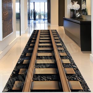 May include: A rectangular hallway rug with a 3D railway track design. The rug features two parallel wooden rails and evenly spaced wooden sleepers set against a dark, stone-like background. The rug is designed to create an optical illusion.