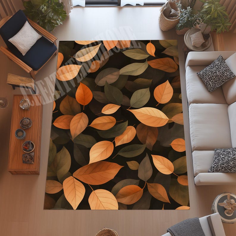 May include: A rectangular area rug featuring a pattern of autumn leaves in shades of orange, brown, and green against a dark background. The rug is placed in a living room setting, with furniture visible around it.