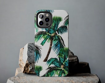 May include: A white phone case with a tropical palm tree design. The case has a black camera lens cutout and a white background.