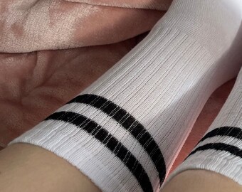 Cute feet in striped socks