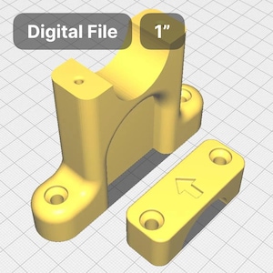 May include: A 3D printed yellow plastic bracket with a 1-inch diameter opening. The bracket is designed to be mounted to a wall or other surface and has a small arrow pointing upwards. The bracket is 1 inch in size.