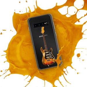 May include: A black Samsung phone case with a vintage electric guitar printed on it. The phone case is surrounded by a yellow paint splatter.