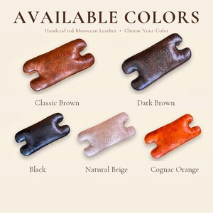Available colors for handmade Moroccan leather camel stool cushions including brown, dark brown, black, natural, and orange leather options.