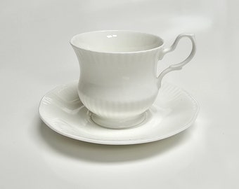 English,  1 fine bone china cup and saucer