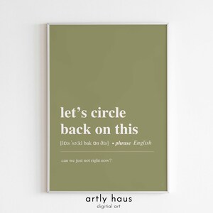 May include: A rectangular wall art print with a sage green background and white text. The print features the phrase let's circle back on this, a phonetic pronunciation guide, the word phrase, the word English, and the sub-text can we just not right now?