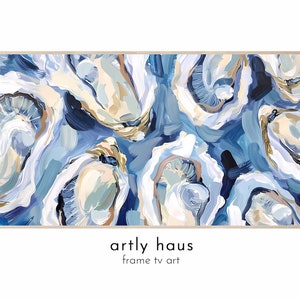 May include: Abstract painting of oyster shells in shades of blue, white, and gold. The painting is framed in a light wood frame. The artist's name, "artly haus", and the phrase "frame tv art" are printed below the painting.