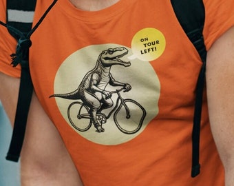 Dinosaur Biking "On Your Left" - Unisex Softstyle T-Shirt