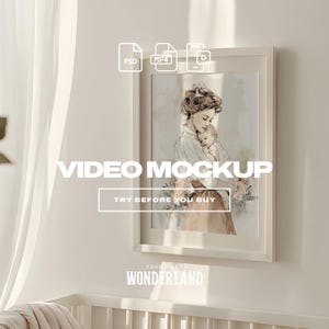 May include: A framed watercolor print of a mother cradling a baby, with soft pastel colors. The frame is white, and the image is displayed in a mock-up setting. Text on the image reads "VIDEO MOCKUP" and "TRY BEFORE YOU BUY". The brand name "WONDERLAND" is also visible.