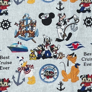 May include: A colorful fabric with a nautical theme featuring Disney characters like Mickey Mouse, Minnie Mouse, Goofy, and Pluto. The fabric has anchors, ships, and the text "Best Cruise Ever".