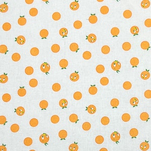 Tela 100% algodón con estampado de pájaros naranjas