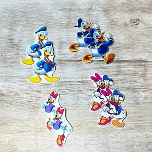 Disney&#39;s Daisy and Donald Duck Flat Back Resin | Hair Bow Center, Key Ring, Scrapbook Embellishment