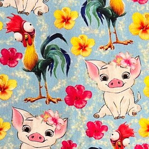 May include: A blue background with a repeating pattern of pink flowers, yellow flowers, a rooster with a red comb and a pig with a pink flower in its hair.