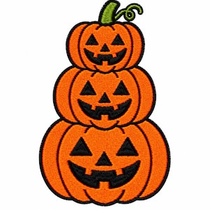 May include: An embroidered patch featuring three stacked orange jack-o'-lanterns with black stitched triangular eyes, noses, and jagged mouths. The top pumpkin has a small green stem with a curly vine, all outlined in thick black thread.