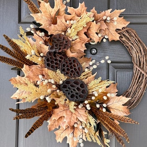Beautiful fall wreath/ front door wreath/neutral fall wreath/feathers/lotus pods/beige maple leaves/pom pom spray/fall decorating/fall decor